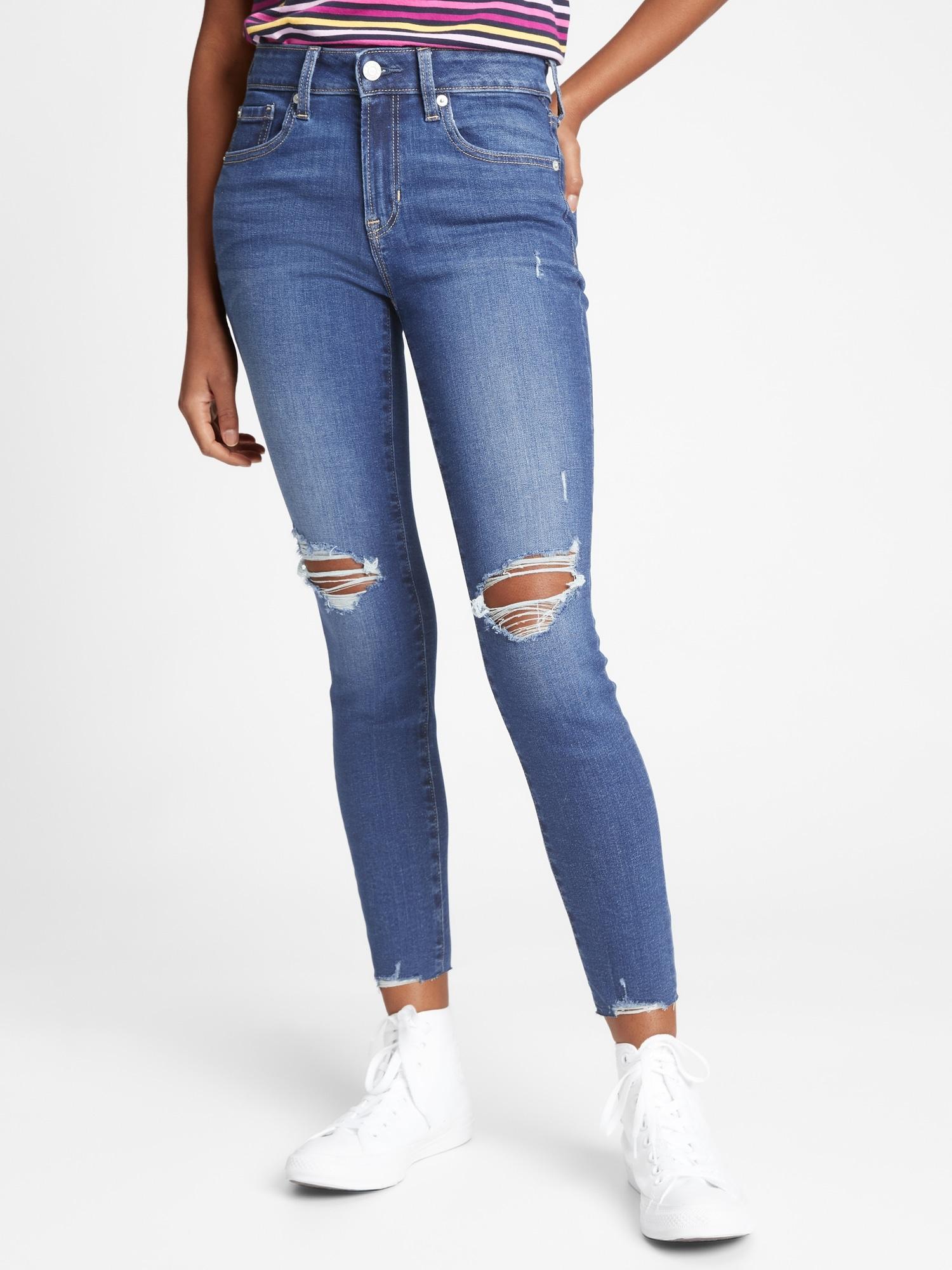 Mid Rise Destructed Universal Skinny Jeans